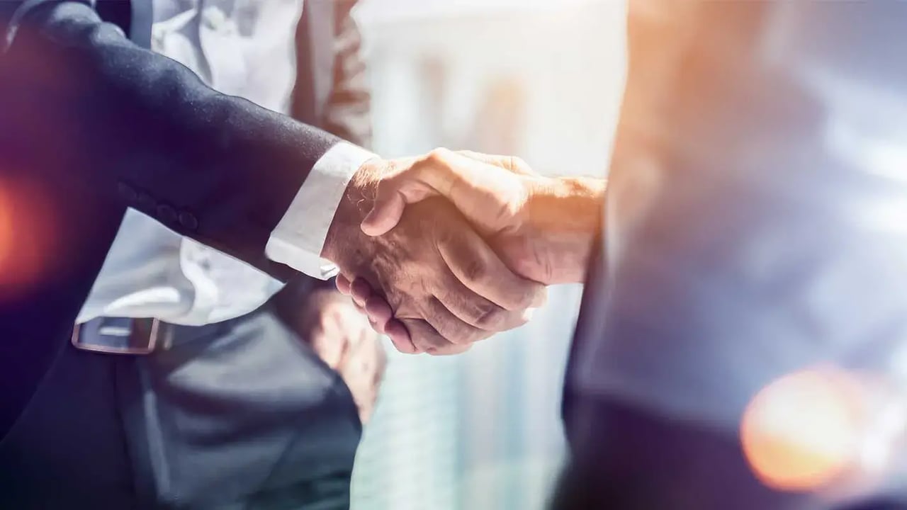 Local business professionals building partnerships and exchanging referrals to generate high-quality commercial insurance leads.
