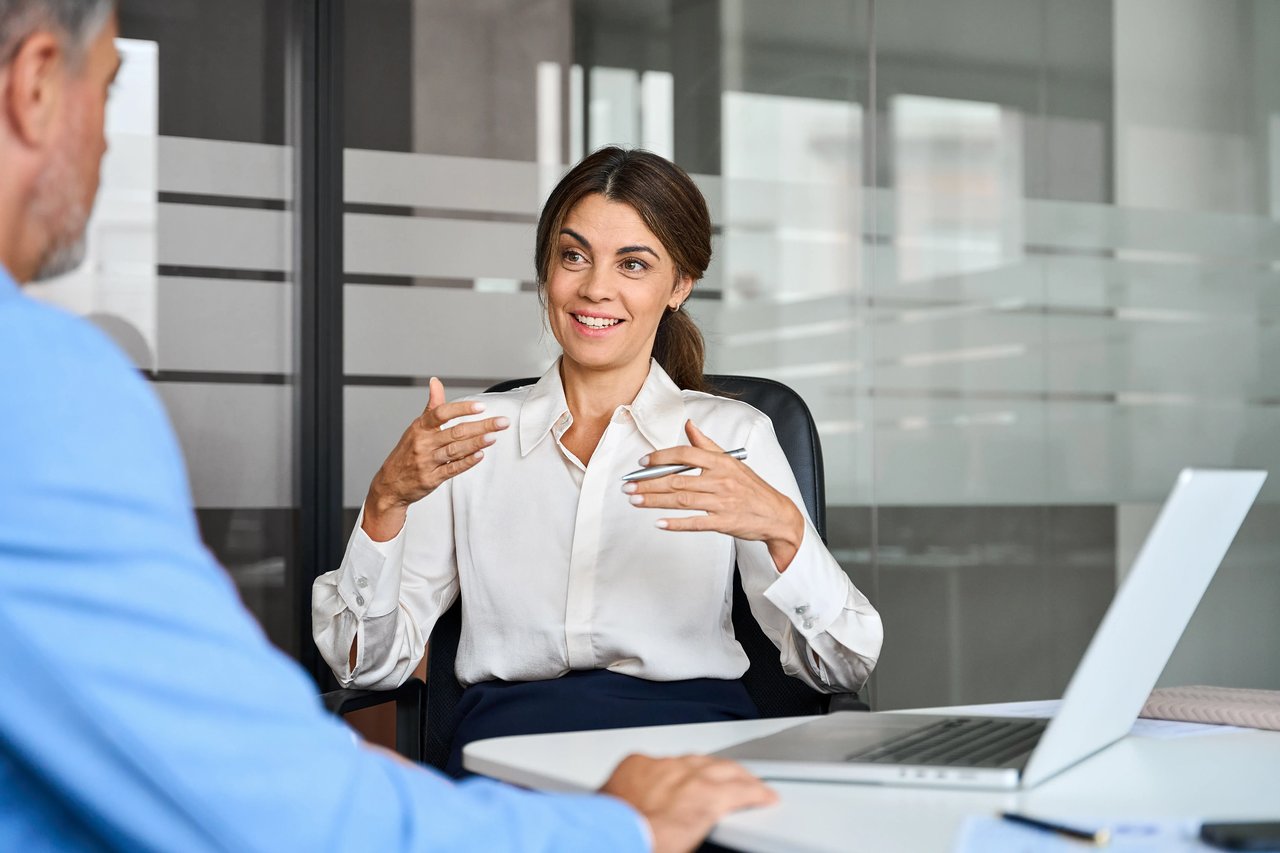 Insurance sales representative adapting a cold call approach based on the prospect's response, demonstrating flexibility between an icebreaker and a direct introduction.