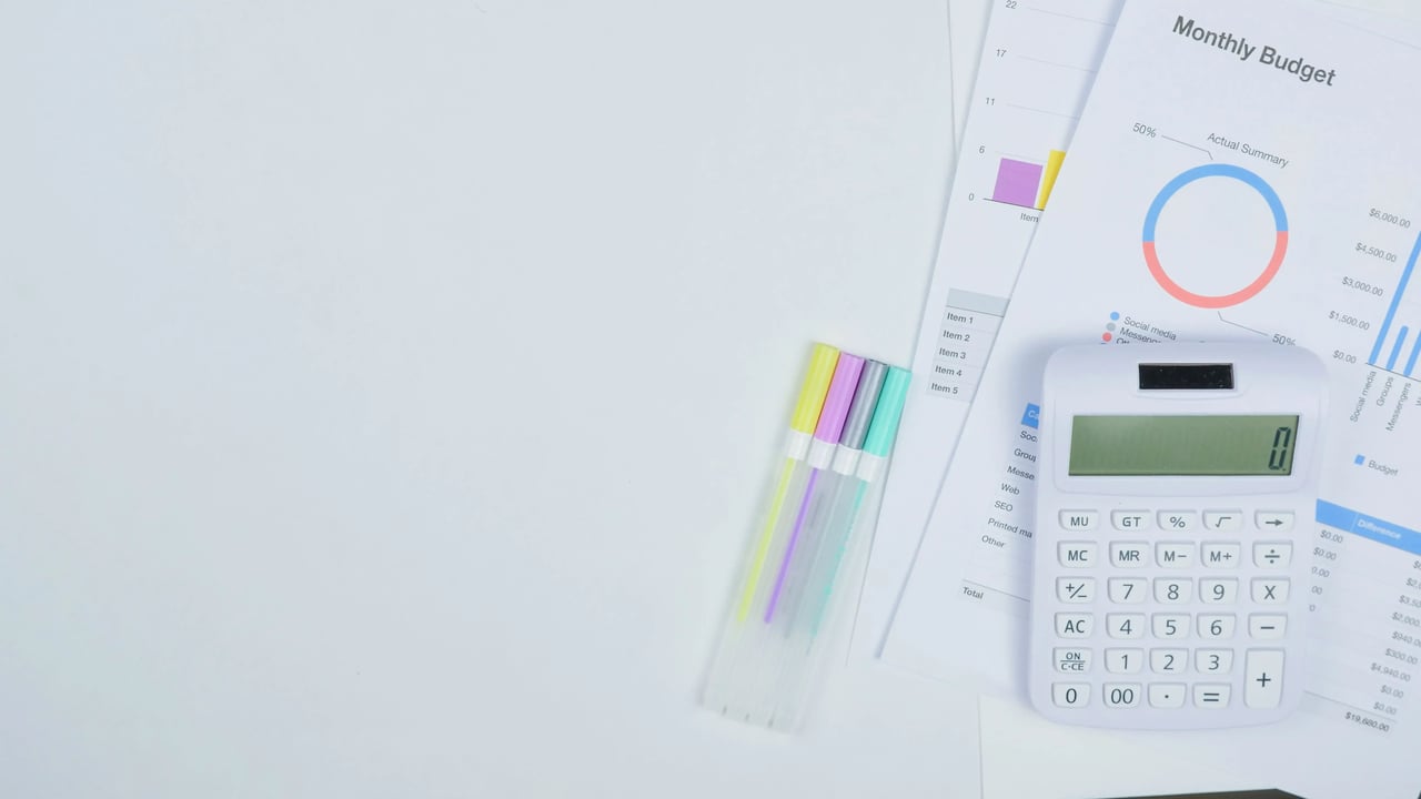 An image illustrating a calculator, limit budget reports.