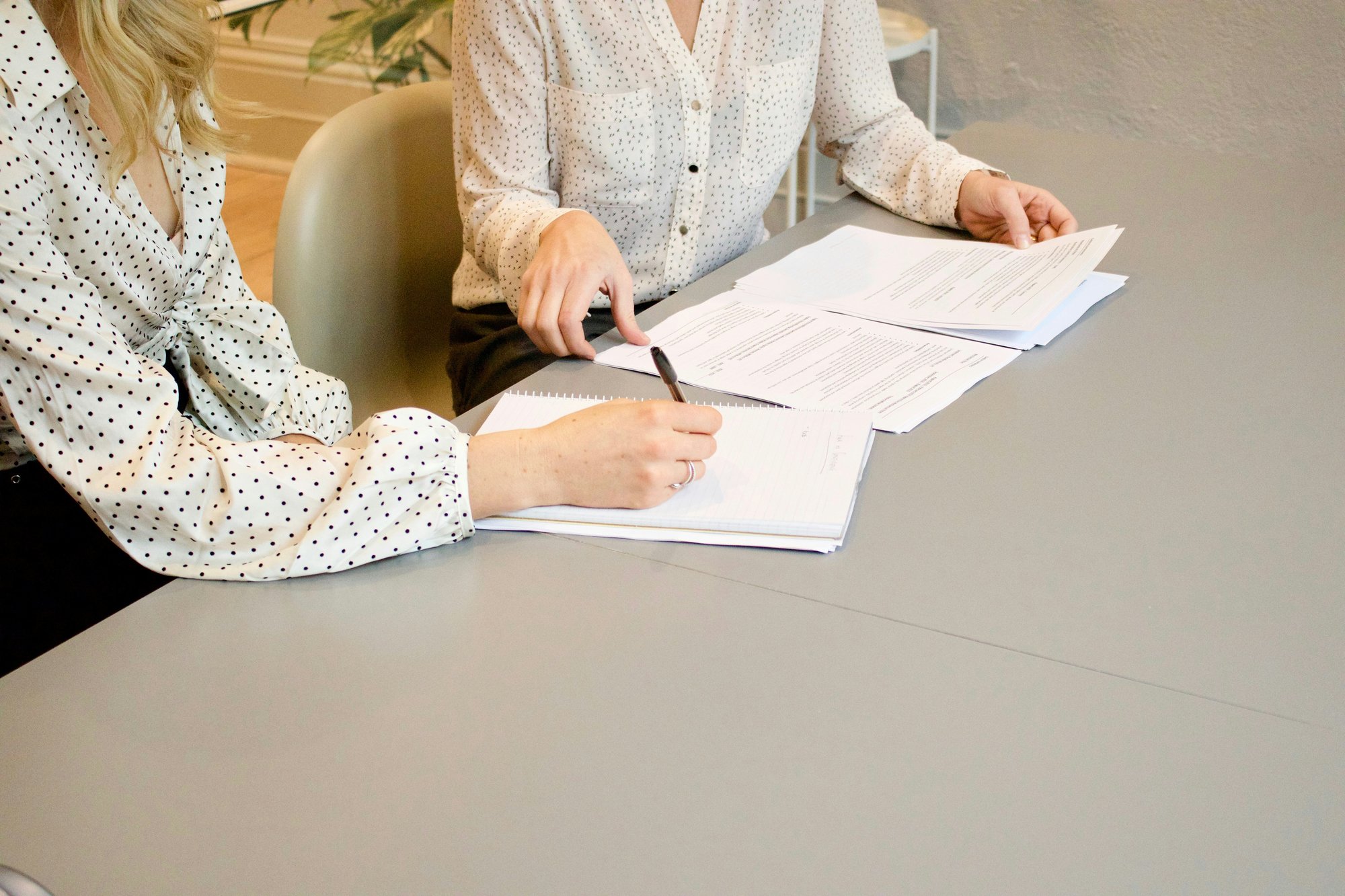 An image illustrating agents reviewing documentation