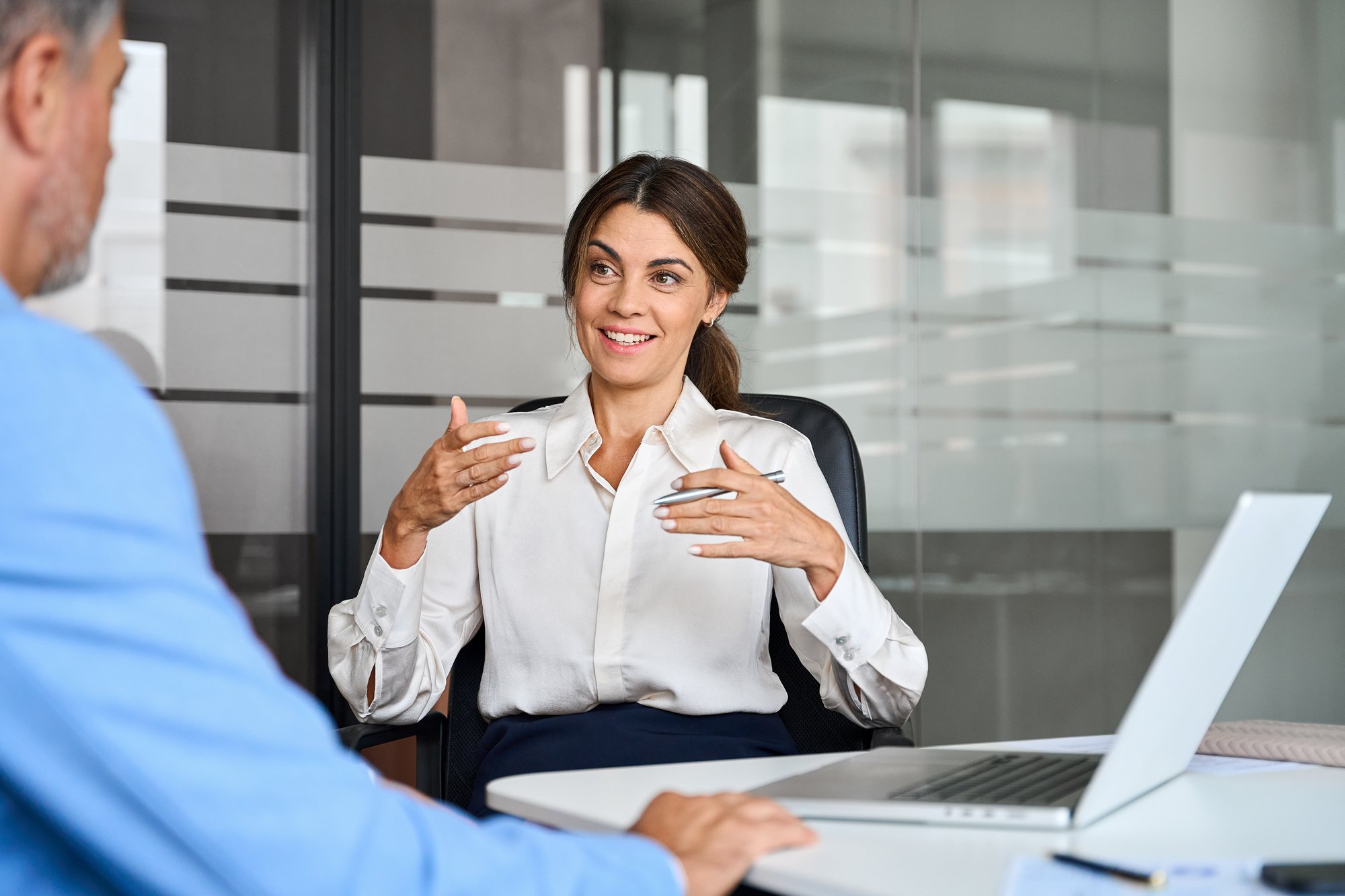 Insurance sales representative adapting a cold call approach based on the prospect's response, demonstrating flexibility between an icebreaker and a direct introduction.