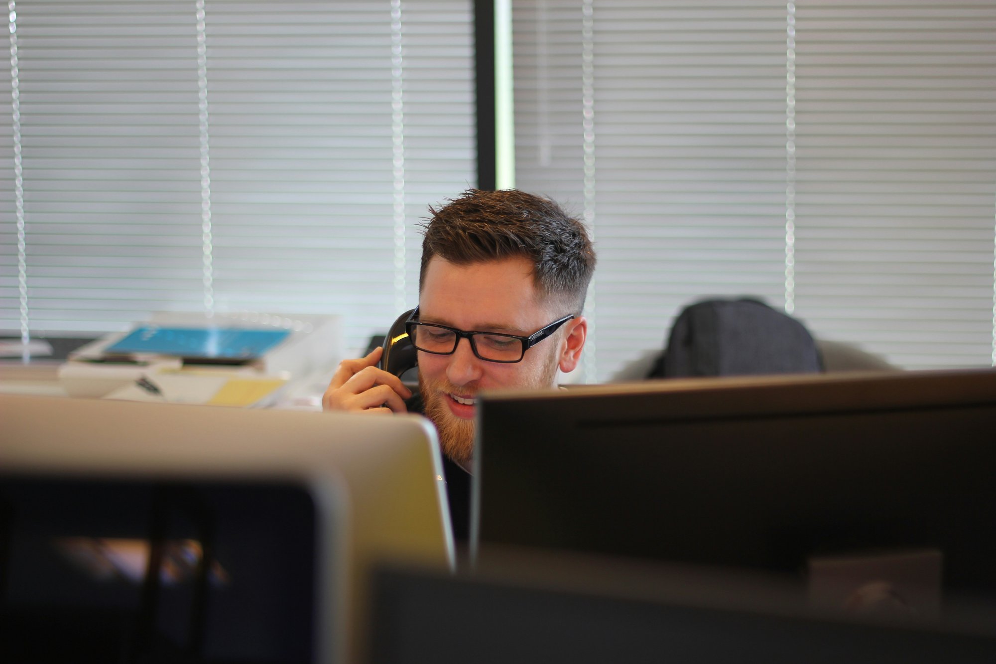 Sales manager providing immediate coaching to a sales representative after a short customer call, helping the rep practice a better response to common objections.